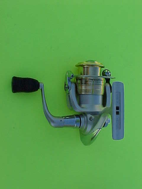 DAIWA SWEEPFIRE 1500B SPINNING REEL, NEW IN THE BOX - Berinson