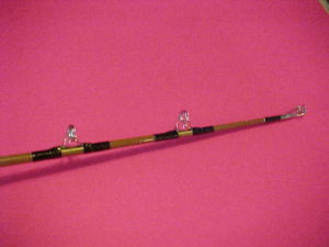 PAIR OF CONVENTIONAL FISHING RODS RODDY 7 FOOT 20 TO 50# ROD AND