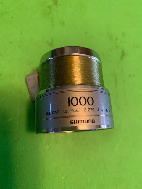 SHIMANO SYMETRE 1000 SPARE FORGED ALUMINUM SKIRTED SPOOL PART NO.  SYM-1000R-1 - Berinson Tackle Company